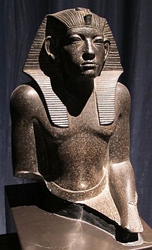 Standing statue of a male king