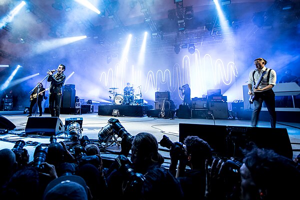 Arctic Monkeys performing at the Roskilde Festival in 2014. From left to right: Nick O'Malley, Alex Turner, Matt Helders and Jamie Cook