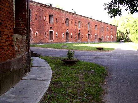 A southern stretch of the ring barracks of the Citadel with a projecting semi-tower on the left
