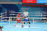 Deutsch: Boxen bei den Olympischen Jugendspielen 2018 Tag 12, 18. Oktober 2018 - Kampf um die Bronzemedaille im Fliegengewicht Mädchen – Heaven Destiny Garcia (USA, blau) schlägt Goryanana Stoeva (Bulgarien, rot) 5-0; Ringrichter ist Ishanguly Meretnyyazov (Turkmenistan). English: Boxing at the 2018 Summer Youth Olympics on 18 October 2018 – Girl's flyweight Bronze Medal Bout - Heaven Destiny Garcia (USA, blue) beats Goryanana Stoeva (Bulgaria, red) 5-0; Referee is Ishanguly Meretnyyazov (Turkmenistan). Español: Boxeo en los Juegos Olímpicos Juveniles de Verano de 2018 en 18 de octubre de 2018 - Combate a medalla de bronce de peso mosca para mujeres: Heaven Destiny Garcia (Estados Unidos, azul) le gana a Goryanana Stoeva (Bulgaria, roja) 5-0; El árbitro es Ishanguly Meretnyyazov (Turkmenistán).