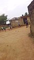 Boys playing football on street.jpg