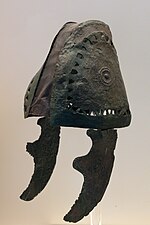 Бронзовый шлем субмикенского периода, Тиринф 1050 - 1025 гг. до н. э.