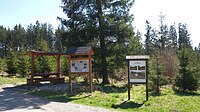 Čeština: Informační panel u chatové oblasti Na výsluní, poblíž štoly Josef. Černá v Pošumaví, okres Český Krumlov, Jihočeský kraj. English: Information board near the cottages Na výsluní, near the "Štola Josef". Černá v Pošumaví, Český Krumlov District, South Bohemian Region, Czechia.