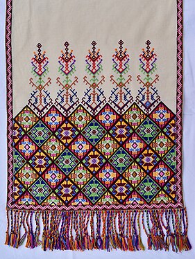 Embroidered geometrical patterns on decorative "table cloth", traditional from Crete, Greece.