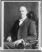 Eugene Victor Debs, three-quarter length portrait, seated, facing slightly left LCCN92504817.jpg