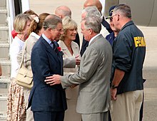Charles and Camilla meeting Federal Emergency Management Agency officials in Louisiana, as they arrive to tour the damage created by Hurricane Katrina, November 2005 FEMA - 18574 - Photograph by Robert Kaufmann taken on 11-05-2005 in Louisiana.jpg
