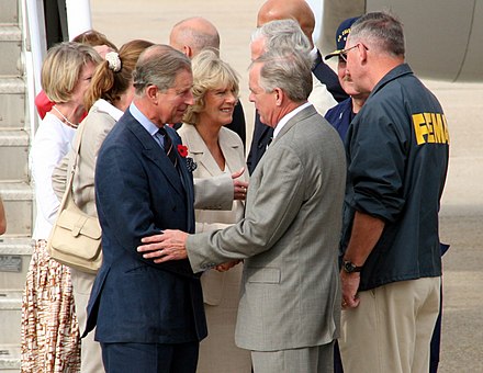 The Prince of Wales and the Duchess of Cornwall meeting Federal Emergency Management Agency officials in Louisiana, as they arrive to tour the damage created by Hurricane Katrina, November 2005