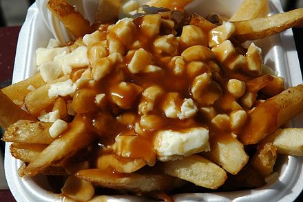 A take-away plate of poutine