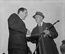 Melvin Johnson and Gen. George Marshall with a disassembled M1941 rifle Gen. Marshall, right, & Melvin Johnson LCCN2016877574.jpg