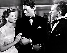 Peck with actors Dorothy McGuire and Sam Jaffe in Gentleman's Agreement (1947) Gentleman's Agreement Publicity Photo.jpg