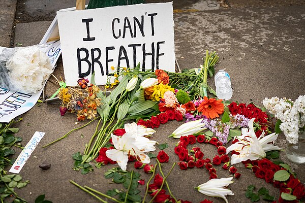 Makeshift memorial near site of murder