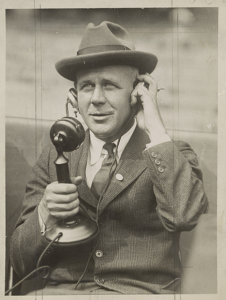Rice on telephone and microphone, c. 1920