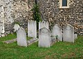 Graves in the churchyard around the Church of John the Baptist in Erith.