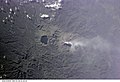 Surroundings of active volcano and Billy Mitchell Lake, forrested older volcanoes and rivers, ISS photo with annotations in photo