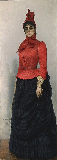 Portrait d'une femme élégante, debout.