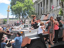 People posing at military hardware displayed in Tbilisi on 26 May 2014 Independence Day of Georgia. Tbilisi. 26.05.2014 02.JPG
