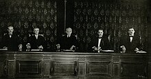 Portrait of the Indiana Supreme Court in their chambers in 1912. From left to right: Douglas Morris, Charles E. Cox, Chief Justice Leander J. Monks, Quincy Myers, and John W. Spencer. Indiana Supreme Court portrait, 1912 - DPLA - bfd4ead1995ececdc7d6aca9b908cf55 (page 1) (cropped).jpg