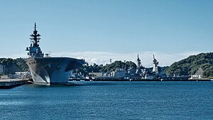 JS Izumo helicopter carrier, the JS Asahi-class destroyer DD-120 Shiranui, and the Kongou-class destroyers inside Yokosuka Naval Base.