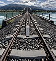 * Nomination Railway bridge across the Ferlach reservoir of the river Drava in Unterschlossberg, Köttmannsdorf, Carinthia, Austria --Johann Jaritz 02:06, 11 October 2017 (UTC) * Promotion Good quality. --King of Hearts 02:28, 11 October 2017 (UTC)  Comment - I think this is an FP. If you nominate it, I will support it, and if you don't nominate it, I'd be happy to do so. -- Ikan Kekek 05:42, 11 October 2017 (UTC) Thank you. Perhaps it is worth trying. -- Johann Jaritz 11:05, 11 October 2017 (UTC)