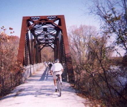 The Katy Trail crosses a creek on a preserved rail bridge in Missouri.