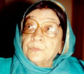 A photograph of an old woman wearing glasses.