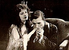 Still with Olive Tell and James W. Morrison in the American film Love Without Question (1920), from an ad on page 4356 of the May 22, 1920 Motion Picture News. Love Without Question (1920) - 8.jpg