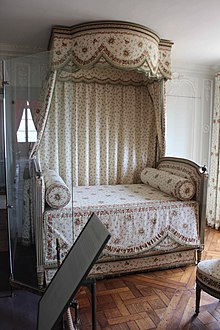 Marie Antoinette's bed, which has a baldachin, in the Petit Trianon (Versailles, France) Marie Antoinette's Bed.jpg