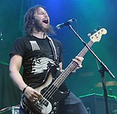 Sanders performing in 2006 Mastodon Troy Sanders 2006.jpg