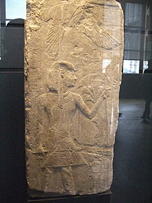 18th dynasty stele depicting the 5th dynasty pharaoh Menkauhor Kaiu.