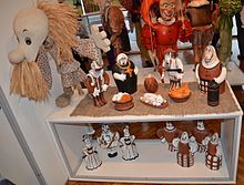 A selection of souvenirs from the Minsk Puppet Theatre. Souvenirs, or artefacts, are part of the servicescape Museum of Minsk Puppet Theatre Belarusian Vertep Souvenirs.JPG