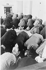 British Muslims in performing the Eid prayers at East London Mosque during the celebration, 1941