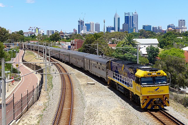 Dual gauge 1,067 mm (3 ft 6 in) and (1,435 mm (4 ft 8+1⁄2 in) Eastern Railway in Perth with an Indian Pacific service in December 2014