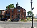 New Life Christian Community Church (and Iglesia de Dios Pentecostal M.I.), located at 150 Middlesex Street, Lowell, Massachusetts. West (front) side of building shown.