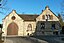 Cemetery building in Ober-Ingelheim, Rotweinstraße 65, on the christ cemetery (founded 1891), three-piece historicizing crushed stone assembly (morgue...