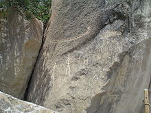 Petroglyphs of a reed boat and men Petroglyphs in Gobustan 09.jpg