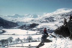 View from the Pinnacles, over the old Turnpike, St. Julitta's Church, Plas y Brenin, Llynnau Mymbyr, Dyffryn Mymbyr, Nant y Gwryd and the Snowdon Horseshoe. Pyb1957.jpg