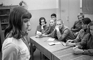 English: A young girl at Komsomol committee session Русский: Молодая девушка на заседании комитета комсомола