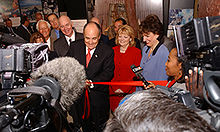 Giuliani cutting the ribbon of the new Drug Enforcement Administration mobile museum in Dallas, Texas, in September 2003 Rudy Giuliani ribbon-cutting ceremony.jpg