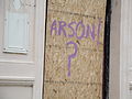 Graffiti at the Savoy Hotel, Sandown, Isle of Wight, in February 2012. Shortly before the photo was taken, a fire destroyed the inside of the hotel (although it was already derelict). These messages were sprayed around the outside, but later cleaned off.