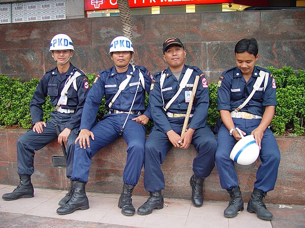 Mall parking lot security guards (Satpam) in Jakarta, Indonesia