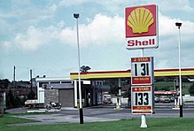A Shell petrol station selling 2* and 4* (leaded petrol) by the gallon in the UK, circa 1980 Shell petrol station in the UK.jpg