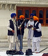 A group of Sikh musicians called Dhadi at the Golden Temple complex Sikh musicians.jpg