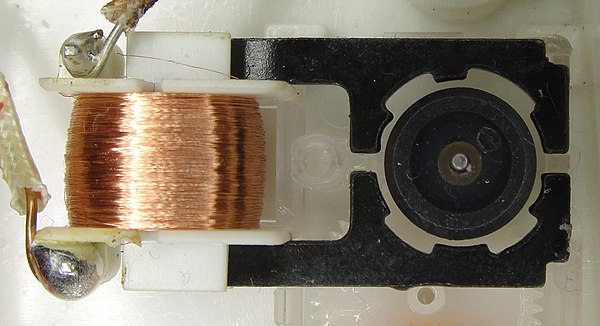 Miniature synchronous motor used in analog clocks. The rotor is made of permanent magnet.