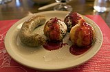 Solvang speciality: medisterpølse with æbleskiver