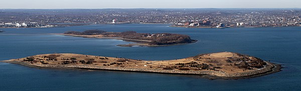 Spectacle Island, in Boston Harbor, and part of the Boston Harbor Islands National Recreation Area. Behind Spectacle Island is Thompson Island.