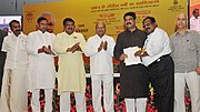 Thumbnail for File:Thaawar Chand Gehlot alongwith the Union Minister for Tribal Affairs, Shri Jual Oram and the Minister of State for Petroleum and Natural Gas (Independent Charge) (5).jpg