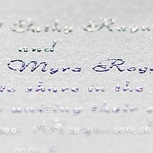 Example of thermographic printing. The uneven quality of the text is a result of the process and easily differentiates thermographic printing from engraving Thermo-stationery.jpg