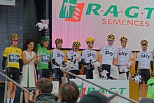 Team Sky prior to stage 2 of the 2017 Tour de France as leaders of the team classification Tour de France 2017, Stage 2 (35546634611).jpg