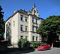 Tenement house with enclosure in open development