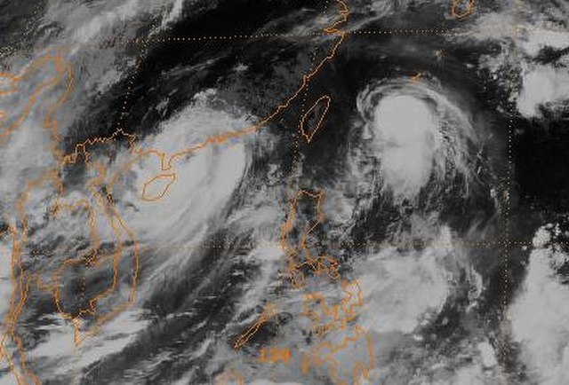 Infrared satellite image of Typhoon Gordon (left) and Tropical Storm Hope (right) on July 18. At the time of this image, Gordon was nearing landfall i